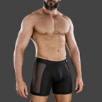 Boxer Malla Cage color negro. Vista trasera con modelo, cinturilla espiga y malla panal lateral. Alepadron.