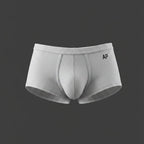 Boxer corto MORLEY color blanco. Vista frontal y posterior con copa anatómica y borde sin ribete. 