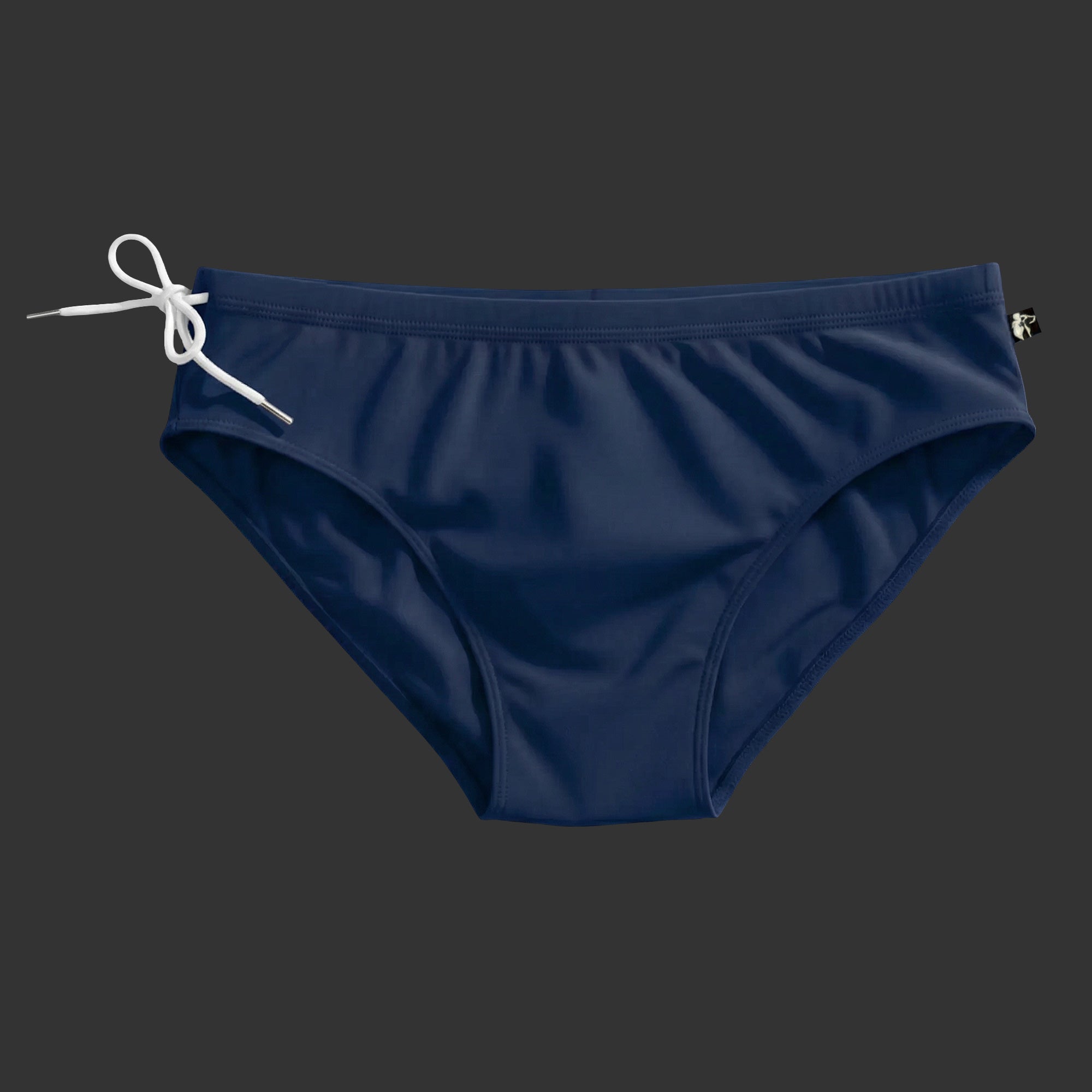 SUNGA NATACIÓN CORTE BRASILERO LYCRA azul. Vista frontal con corte reducido y ajuste anatómico. Alepadron.