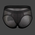 Modelo usando Slip Transparente AP. Detalle de espalda en tul transparente. Alepadron.